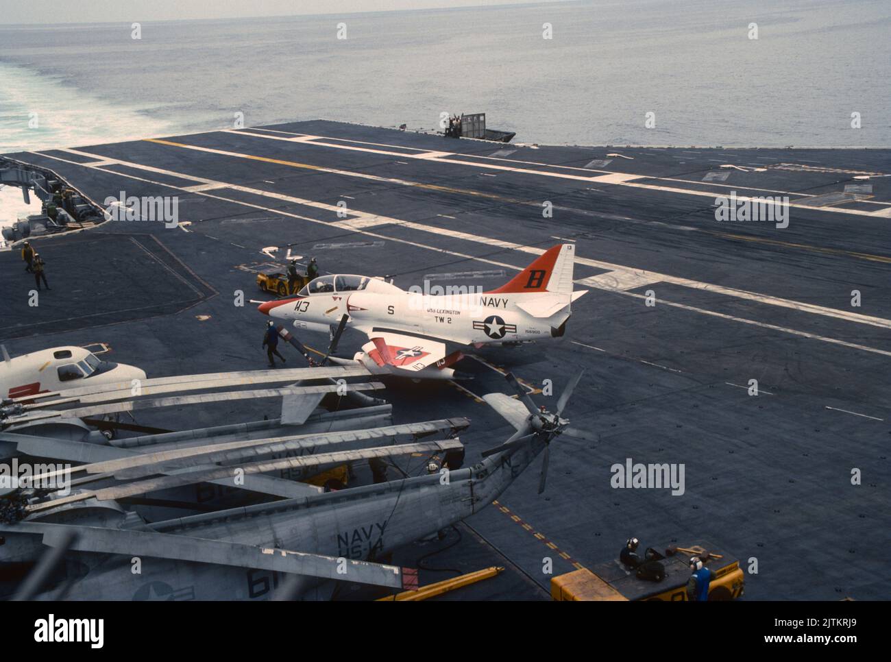 Douglas A-4 Skyhawk trainer aircraft on the deck during carrier quals at sea Stock Photo