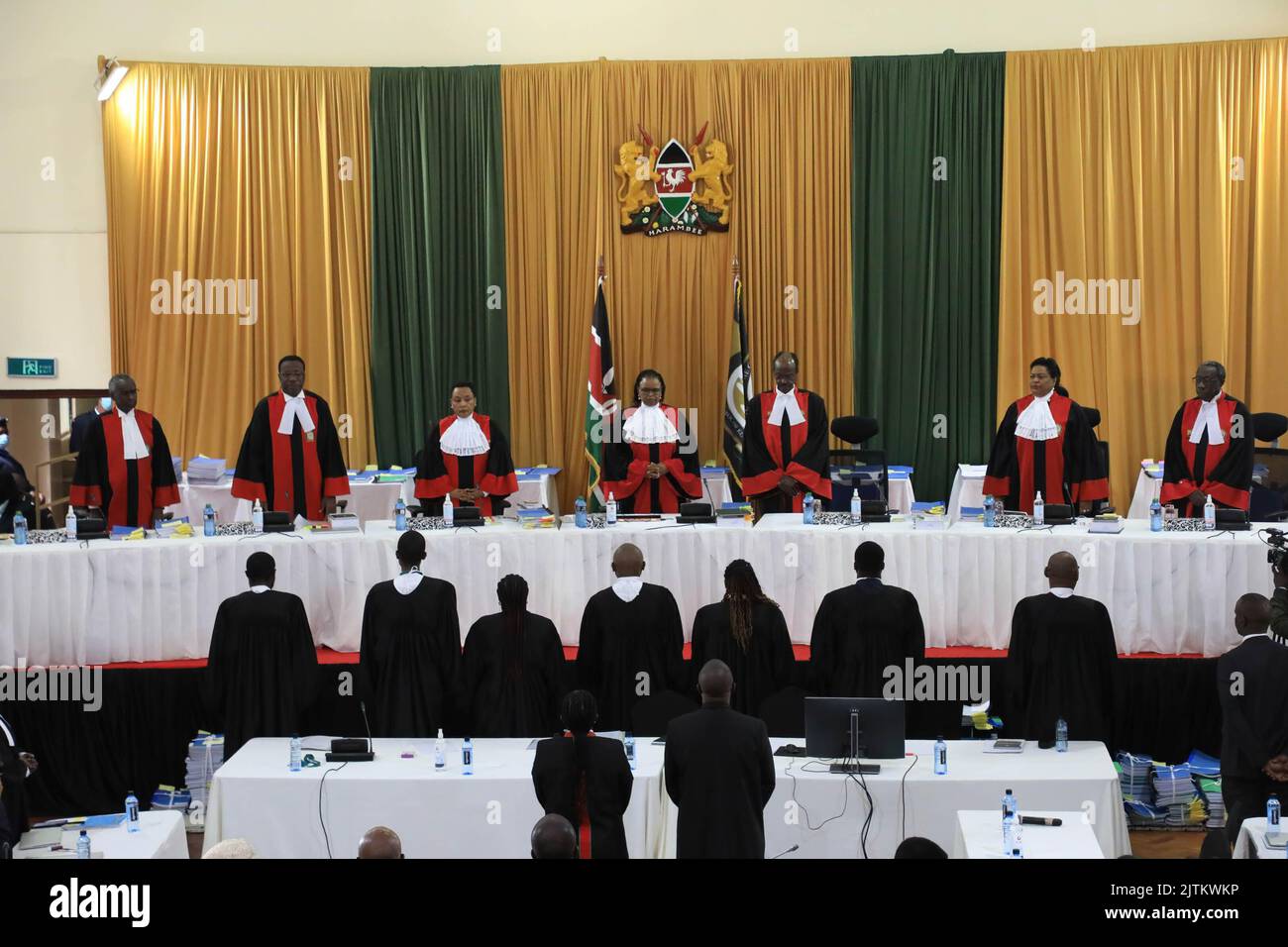 Chief justice of the supreme court Martha Koome (C) presides over a bench of seven judges which consists of (L-R) Supreme court judges, Isaac Lenaola, Smokin Wanjala, Philomena Mwilu, Mohamed Ibrahim, Njoki Ndungu, and William Ouko during day one of the presidential election petition at the Supreme Court. Azimio la Umoja One Kenya coalition presidential candidate Raila Odinga on August 22, 2022 filed a petition at the Supreme Court Sub-Registry offices seeking to challenge the victory of president elect William Ruto which he termed as 'null and void'. Stock Photo