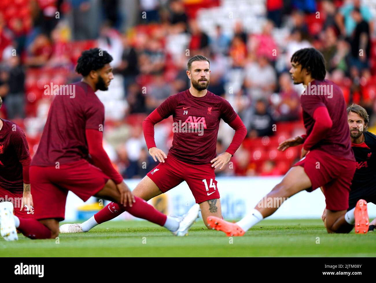 Liverpool's Jordan Henderson (centre) warms up on the pitch ahead of the Premier League match at Anfield, Liverpool. Picture date: Wednesday August 31, 2022. Stock Photo