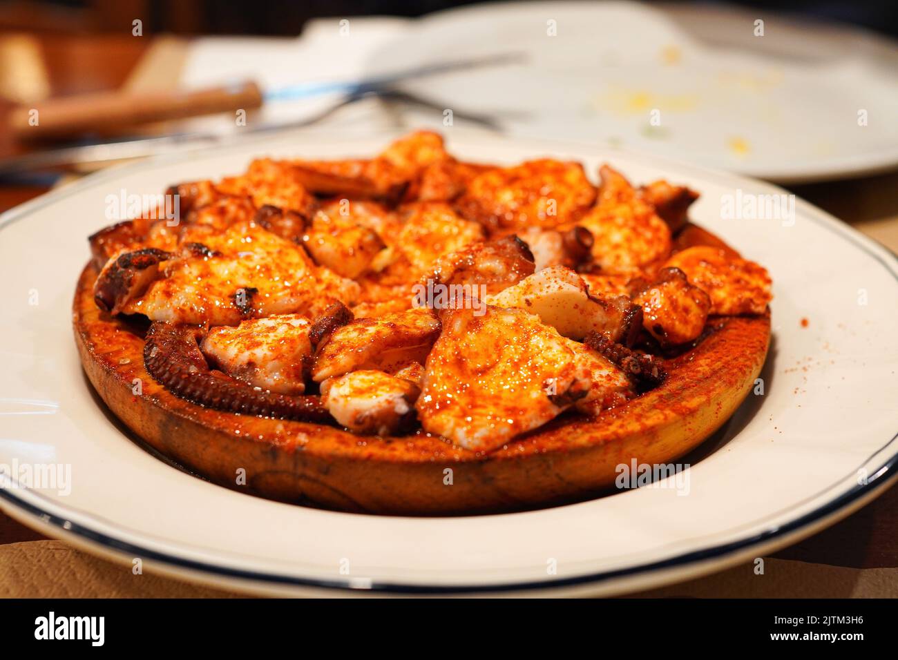 Pulpo a la gallega (Pulpo á feira) , Galician-style cooked octopus, very popular Spanish tapas Stock Photo