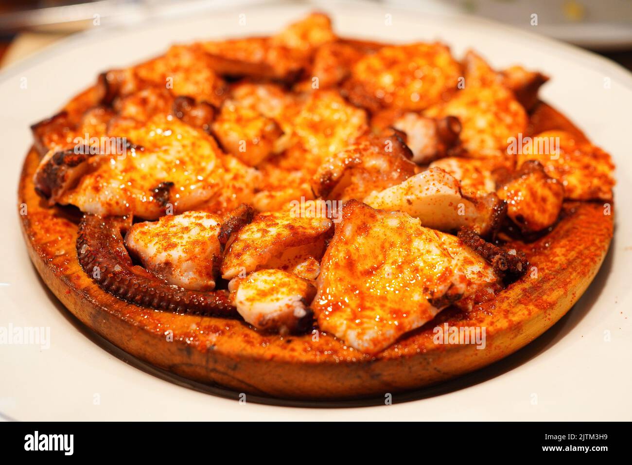 Pulpo a la gallega (Pulpo á feira) , Galician-style cooked octopus, very popular Spanish tapas Stock Photo