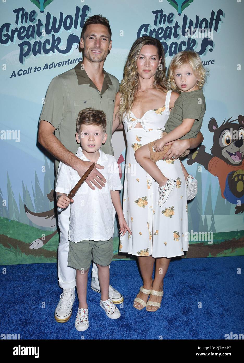 Andrew Walker, Cassandra Walker, West Walker and Wolf Walker arriving ...