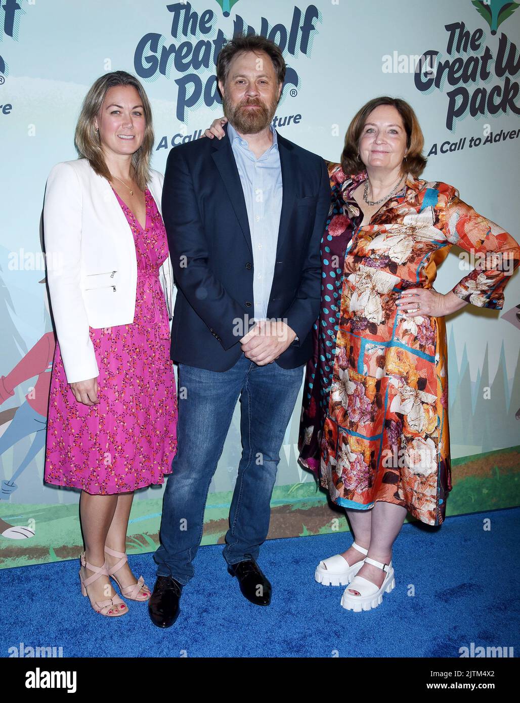 Brooke Patterson, Kent Redeker and Julia Pistor arriving to the 'The Great Wolf Pack: A Call To Adventure' Premiere held at the Great Wolf Lodge on August 23, 2022 Garden Grove, California © Janet Gough / AFF-USA.com Stock Photo