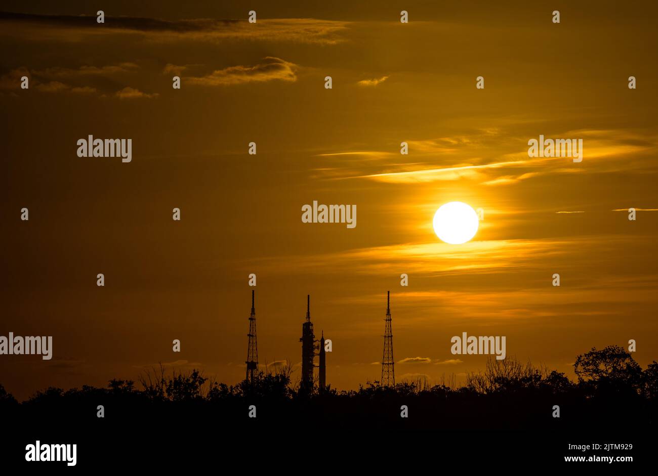 Kennedy Space Center, United States of America. 31 August, 2022. The NASA Space Launch System rocket with the Orion spacecraft is silhouetted by the sunrise on Launch Complex 39B at the Kennedy Space Center, August 31, 2022, in Cape Canaveral, Florida. The countdown for the un-crewed flight test has been rescheduled for September 3rd following a problem with the fuel system caused an extended delay. Credit: Bill Ingalls/NASA/Alamy Live News Stock Photo