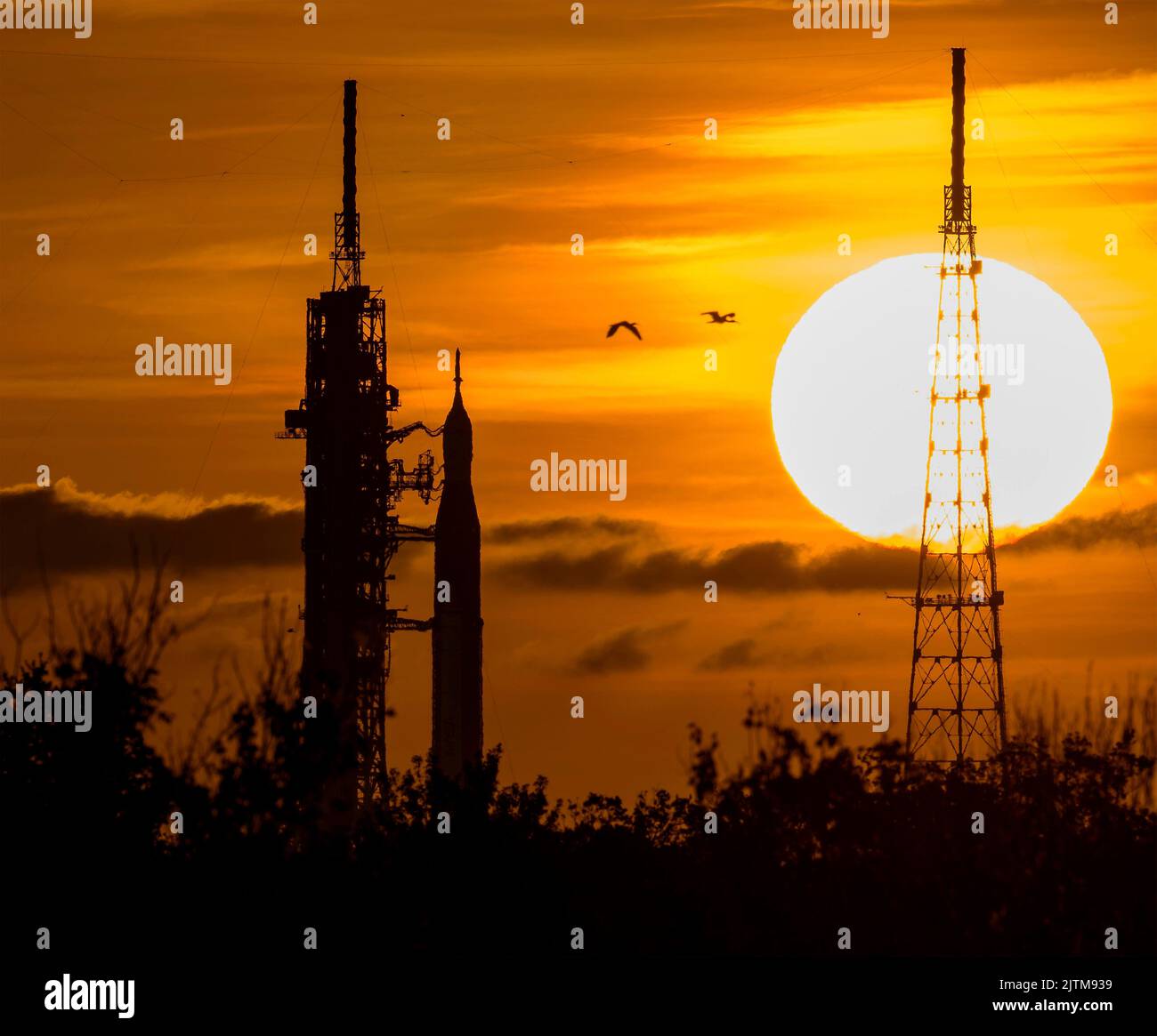 Kennedy Space Center, United States of America. 31 August, 2022. The NASA Space Launch System rocket with the Orion spacecraft is silhouetted by the rising sun on Launch Complex 39B at the Kennedy Space Center, August 31, 2022, in Cape Canaveral, Florida. The countdown for the un-crewed flight test has been rescheduled for September 3rd following a problem with the fuel system caused an extended delay. Credit: Bill Ingalls/NASA/Alamy Live News Stock Photo