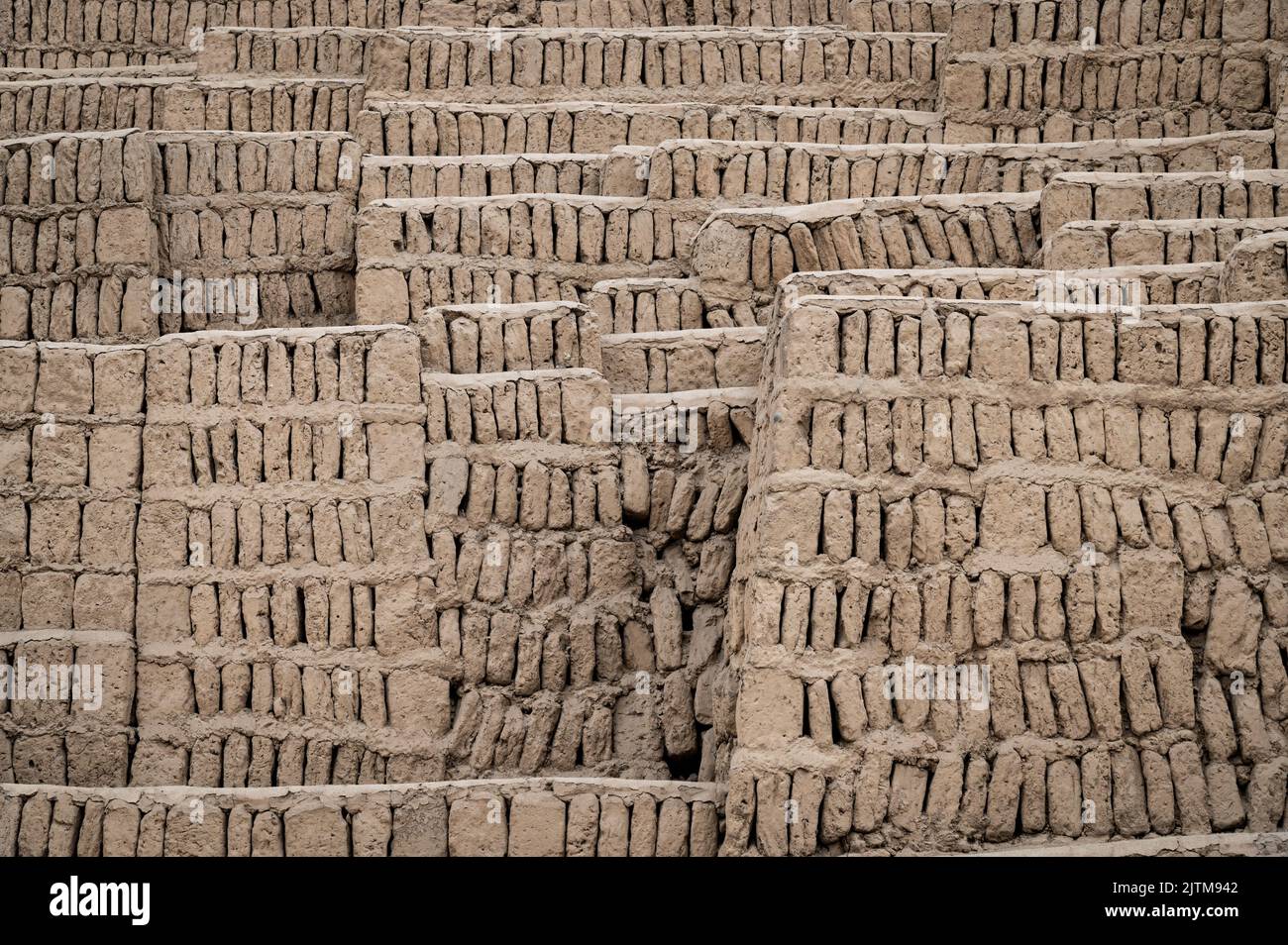 Photo of adobe and clay pattern at the Huaca Pucllana ruins site in the Miraflores District of Lima, Peru Stock Photo