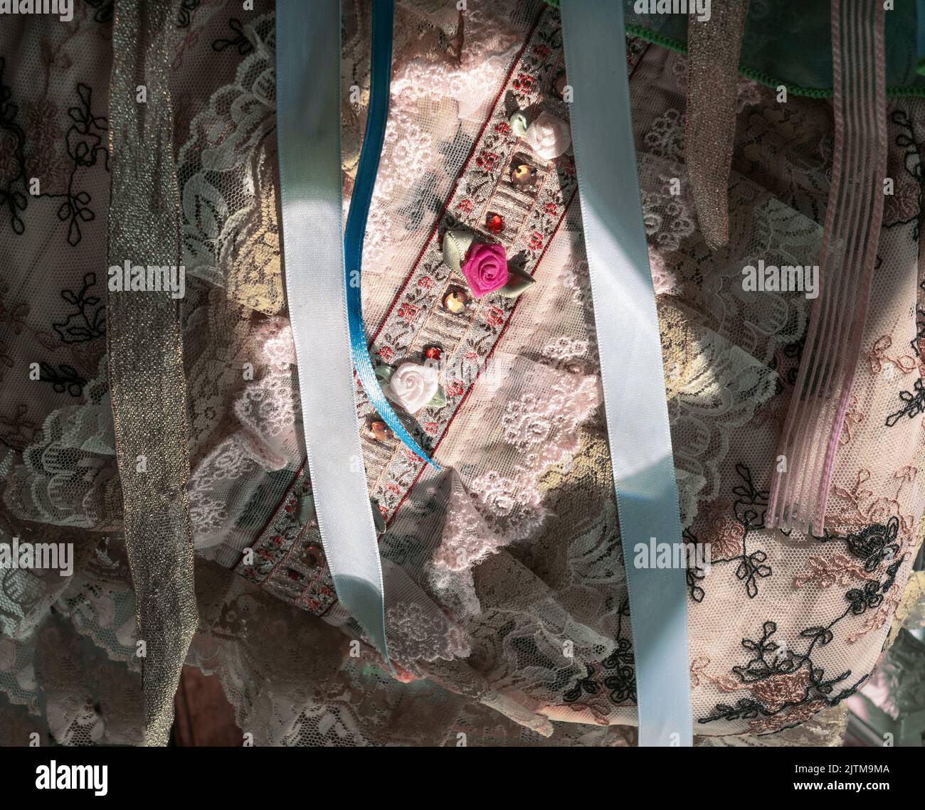 Spotlight is on fabric roses with ruffles, ribbons, eyelet and