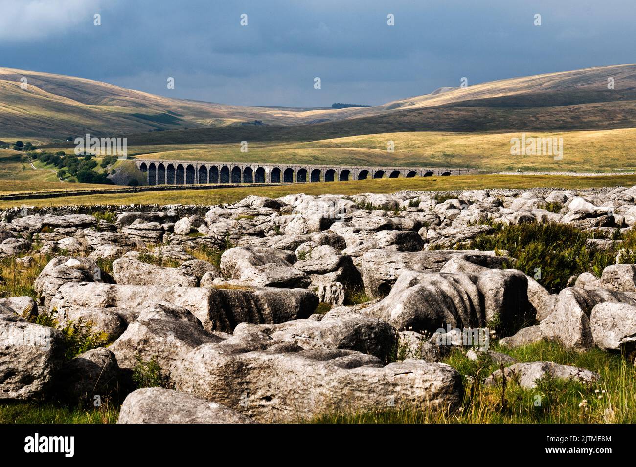 Batty Moss (aka Ribblehead) Viaduct on the Settle-Carlisle line seen from limestone pavement rocks to the south west, Yorkshire Dales National Park. Stock Photo
