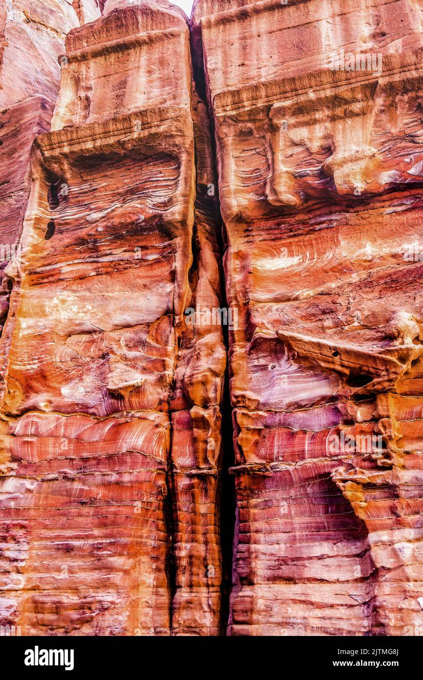 Rose Red Rock Tomb Street of Facades Petra Jordan.  Built by Nabataens in 200 BC to 400 AD Canyon walls create many abstracts close up Stock Photo