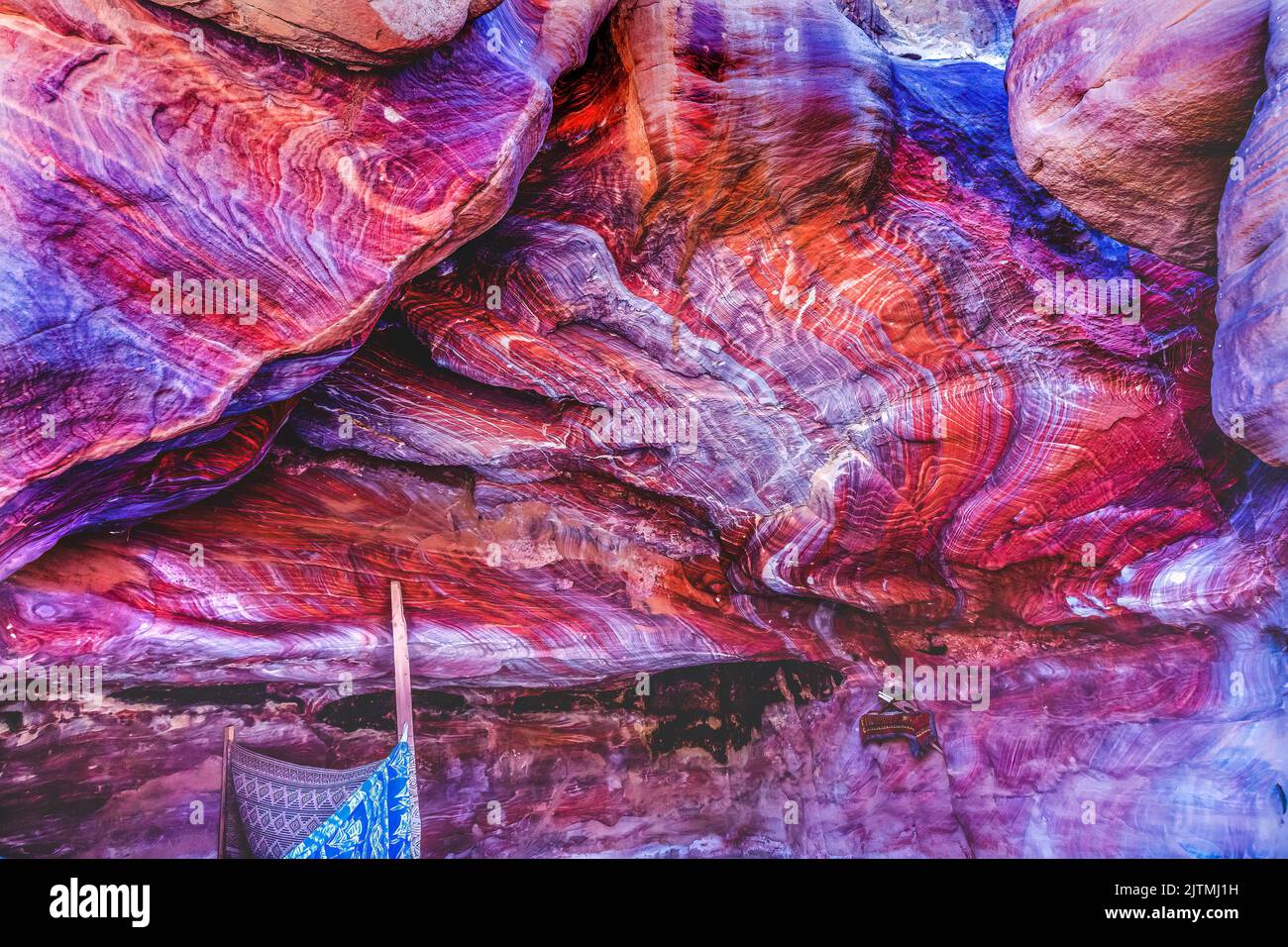 Red Rock Abstract Cave Petra Jordan Built by Nabataens in 200 BC to 400 AD Canyon walls create many abstracts close up Stock Photo