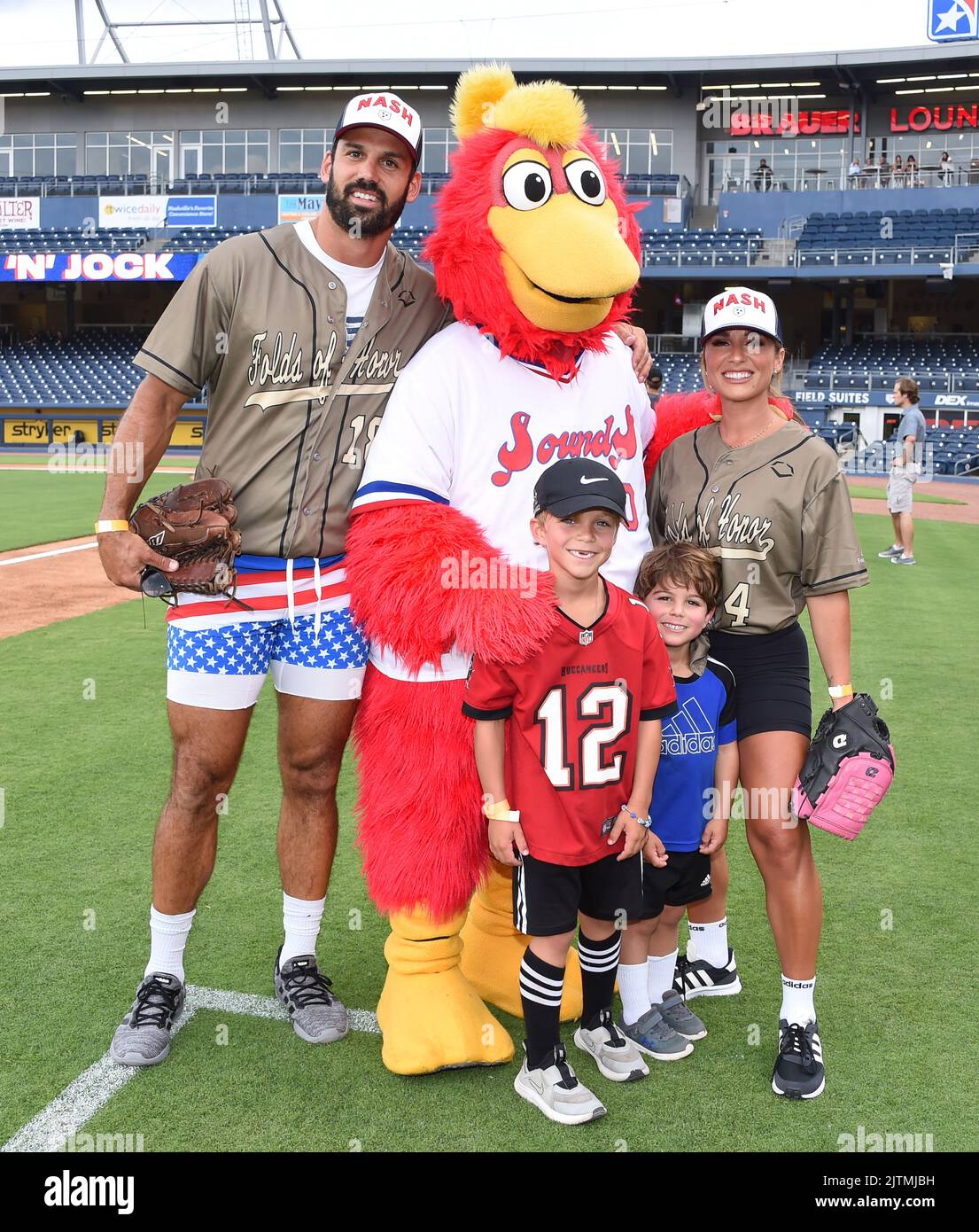 Eric Decker, Eric Decker II, Forrest Decker and Jessie James Decker at the  2nd annual Folds of Honor Rock n Jock game held at the First Horizon Park on  June 6, 2022, image size:1105x1390