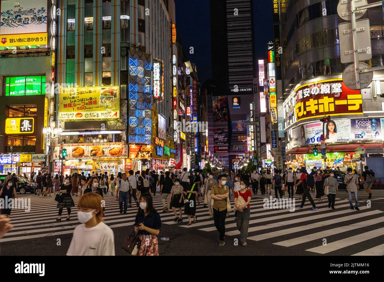 Neon signs along the red light and entertainment district of Shinjuku ...