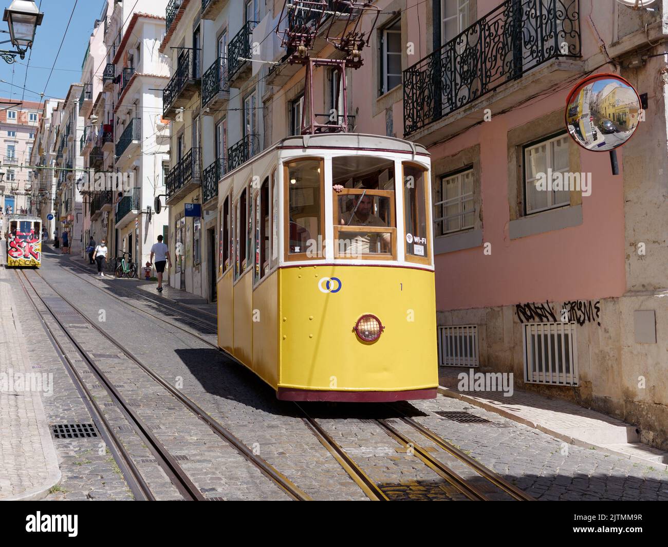Trams aka Streetcar aka Trolley on a steep road in the BaixaChiado area of Lisbon with the