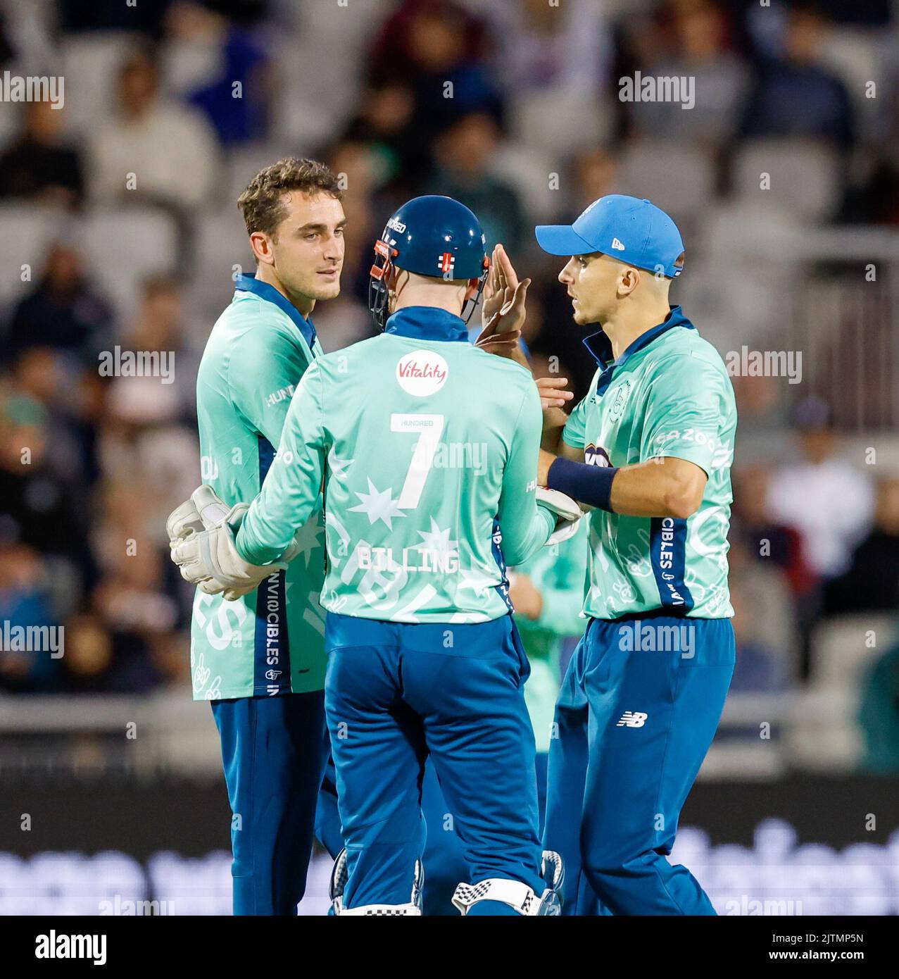 Old Trafford, Manchester, UK. 31st Aug, 2022. The Hundred Match 32 Mens cricket: Manchester Originals versus Oval Invincibles; Peter Hatzoglou (R) takes the wicket of Laurie Evans of Manchester Originals Credit: Action Plus Sports/Alamy Live News Stock Photo