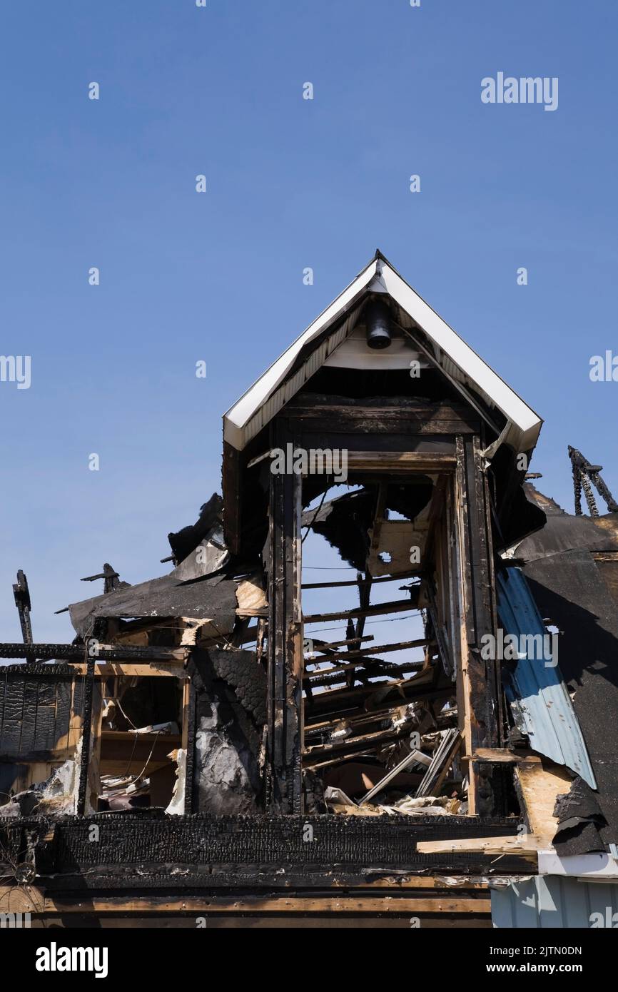 Cottage style home damaged by fire Stock Photo - Alamy