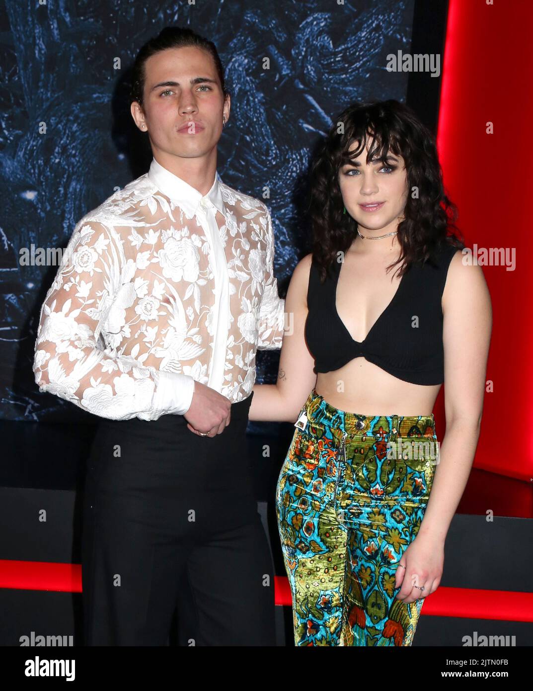 Tanner Buchanan and Mary Mouser attending the 'Stranger Things' Season
