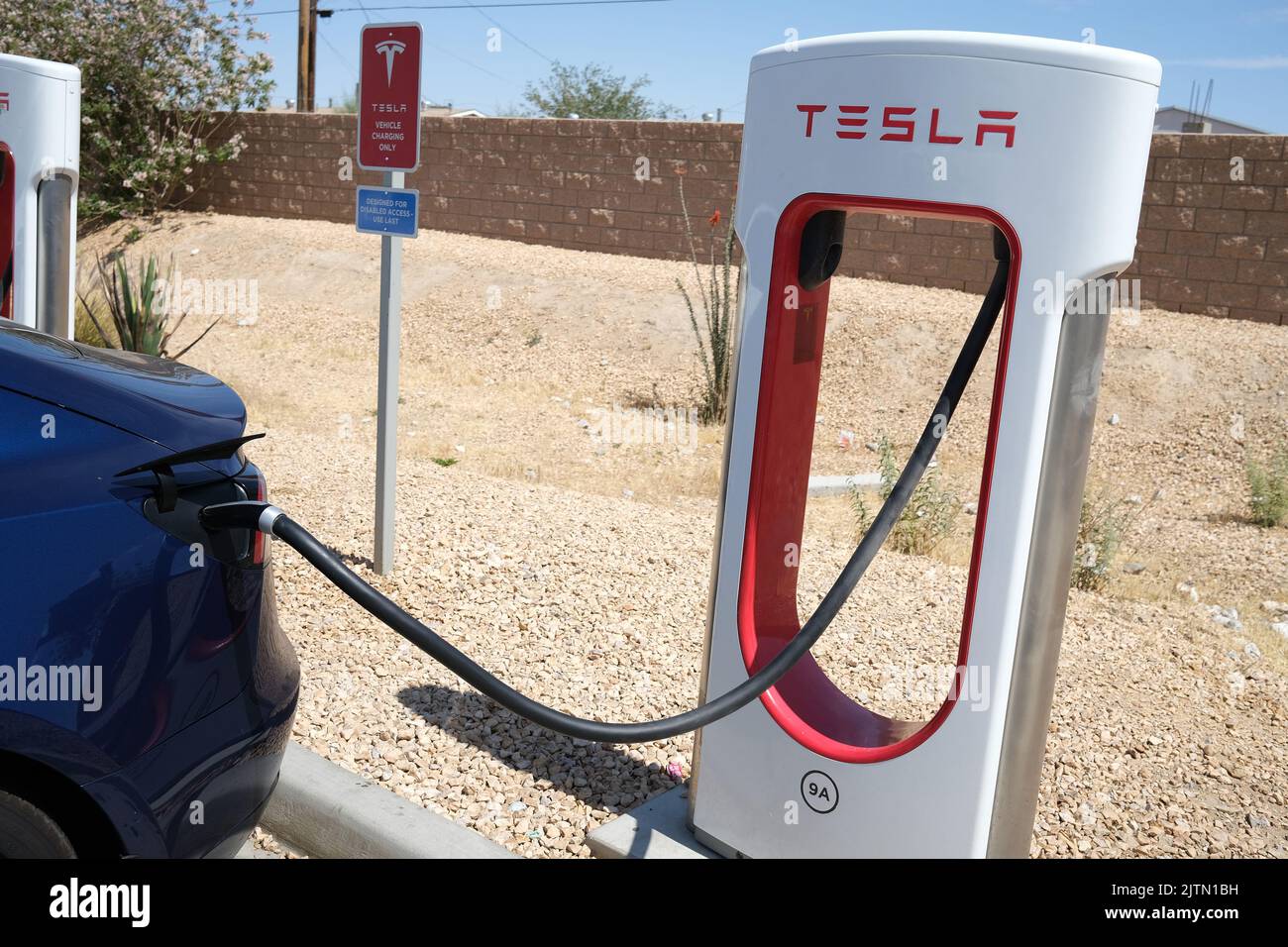 Tesla charging station at EddieWorld Stock Photo Alamy