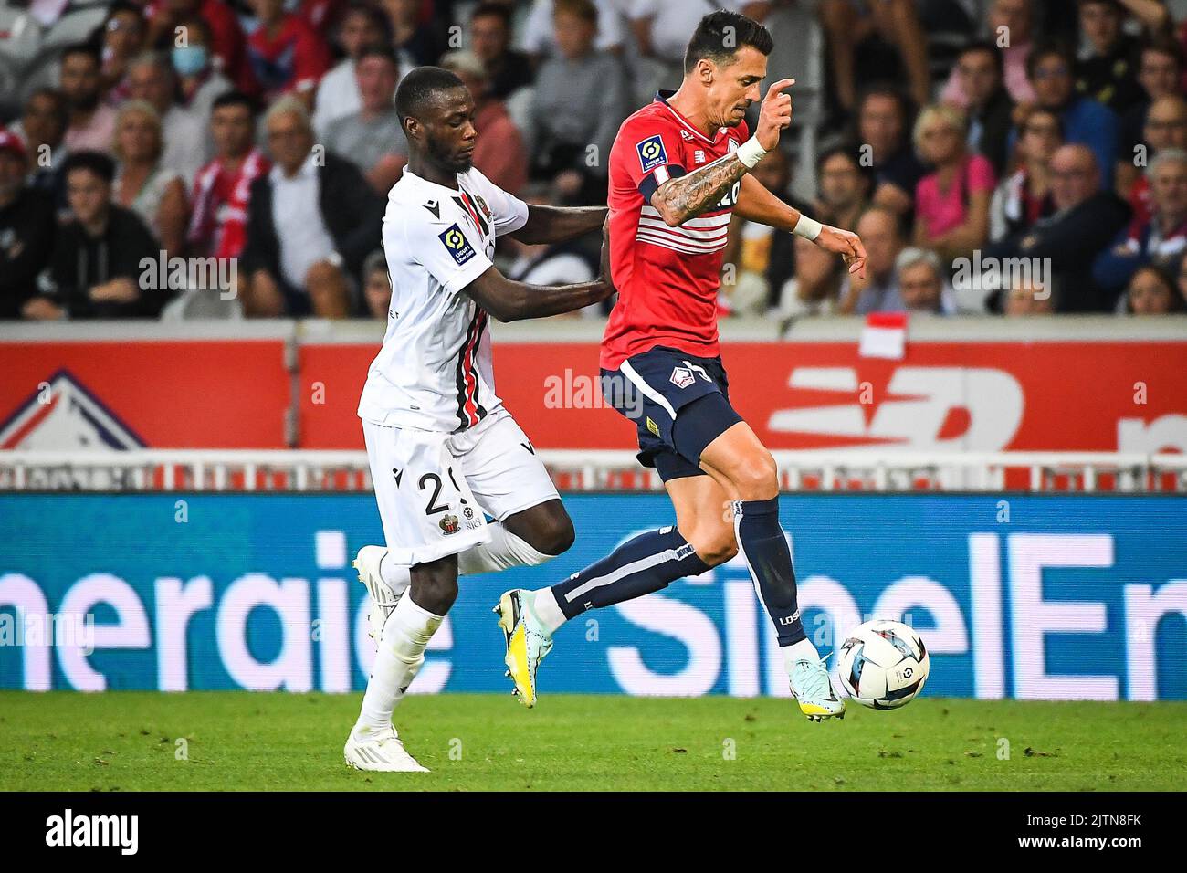 Lille, France - 31/08/2022, Nicolas PEPE of Nice and Jose FONTE of Lille  during the French championship Ligue 1 football match between LOSC Lille  and OGC Nice on August 31, 2022 at