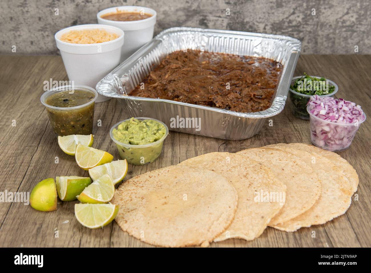 Family sized Mexican food meal comes with slow cooked birria, homemade
