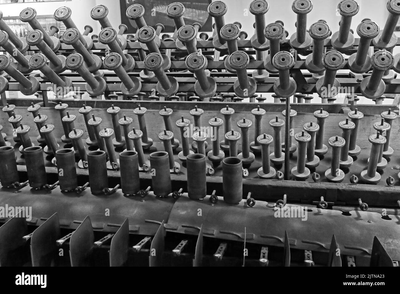 Old Textile Mill Cotton Spinning Machine, BW Stock Photo