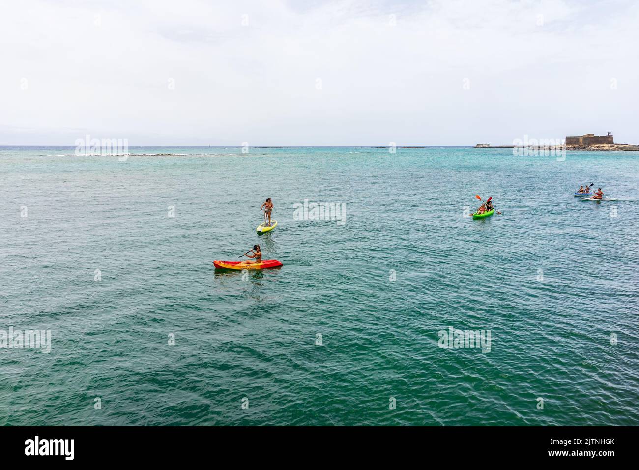 ARRECIFE, LANZAROTE, CANARY ISLANDS JULY 16, 2022 Boat and SUP