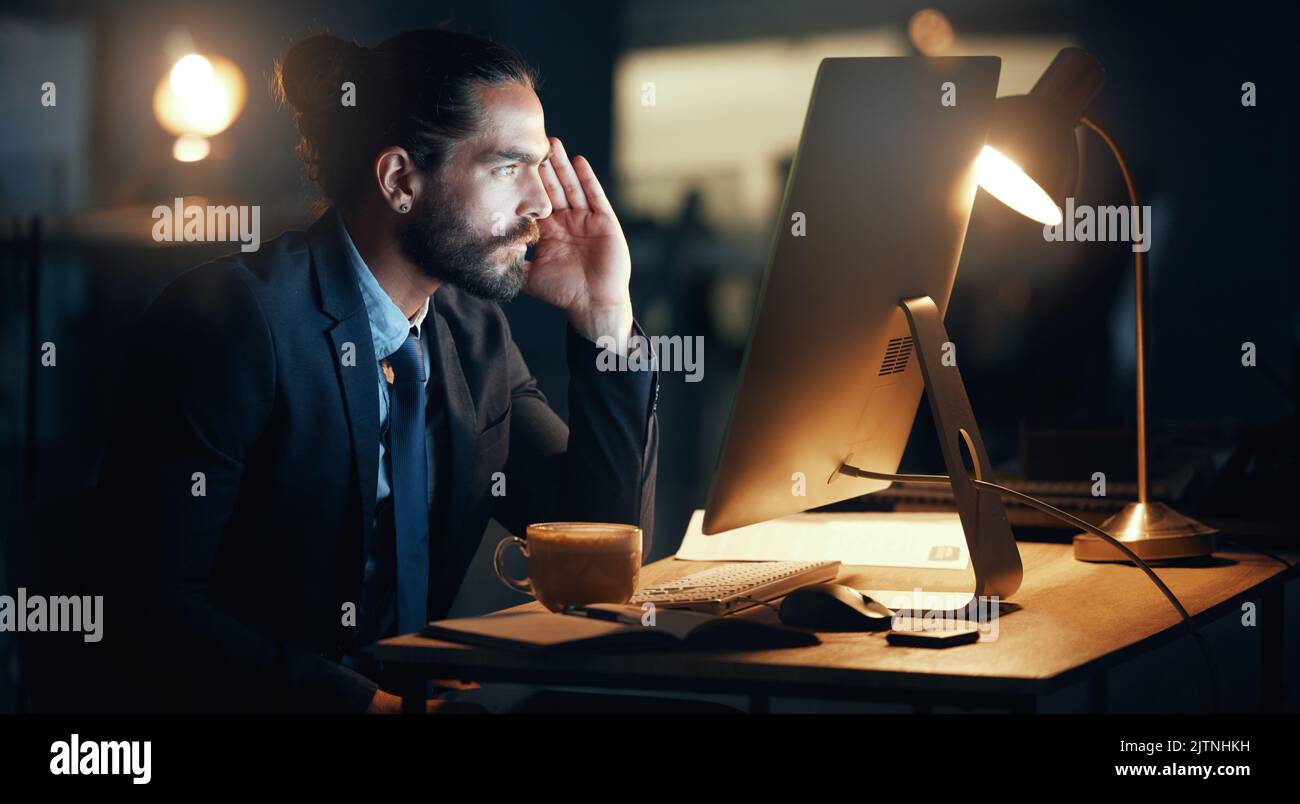 Confused, business man and computer stress while finishing work deadline at night with pc glitch. Corporate male with anxiety about target working at Stock Photo