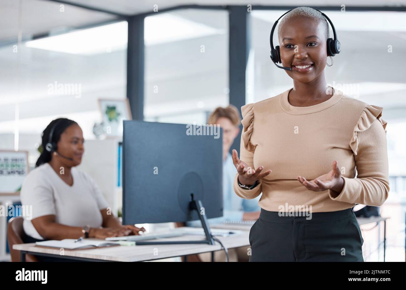 Crm, woman and customer support contact us consultant talking on a customer phone consultation. Happy internet call center employee with headset Stock Photo
