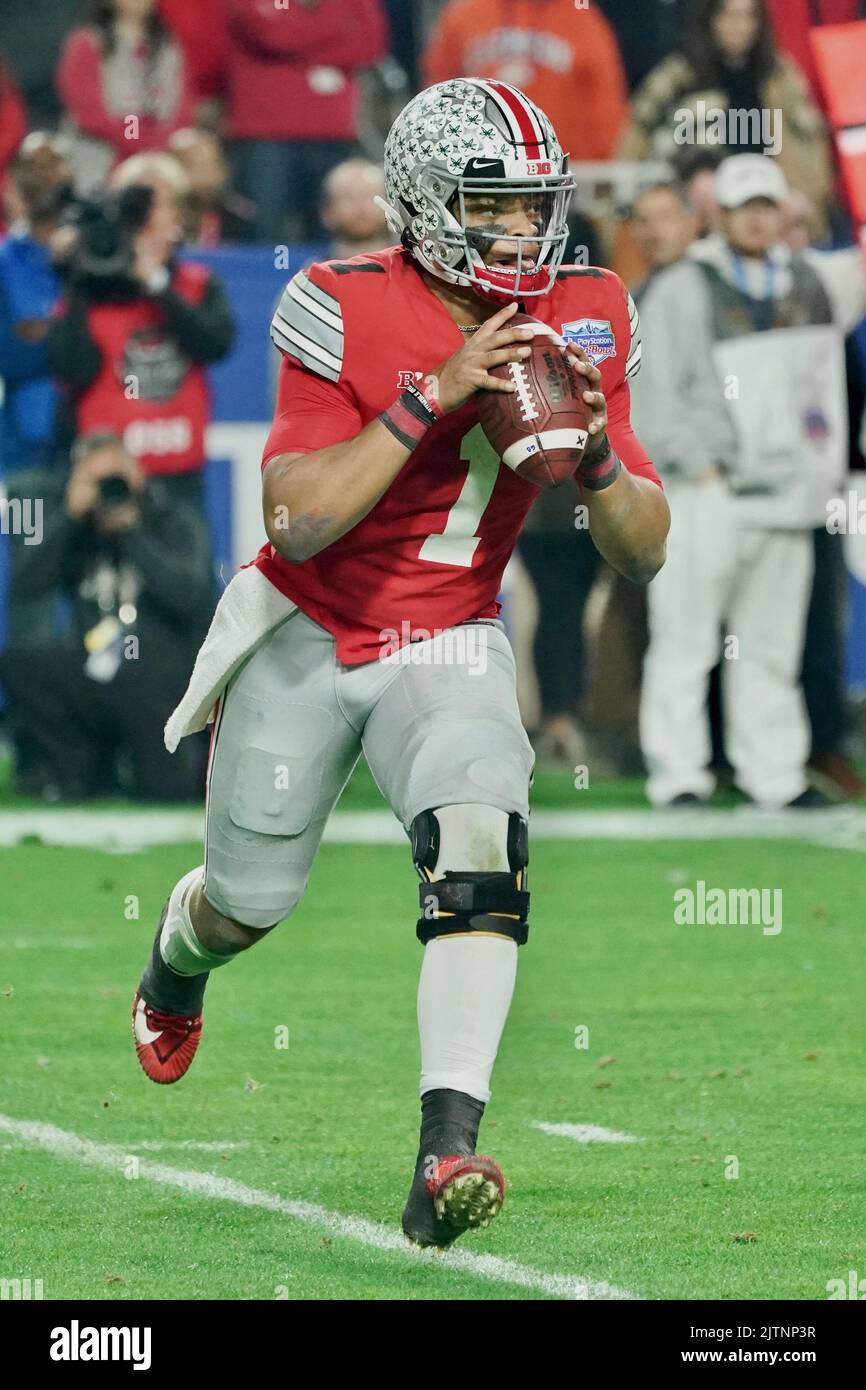 Ohio State Buckeyes quarterback Justin Fields in action during the Fiesta Bowl. Stock Photo