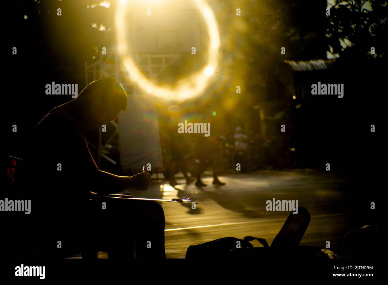 Strange effects from camera lenses create sunlight. Light pants surrounding people or objects are the technology of ancient len cametra Stock Photo