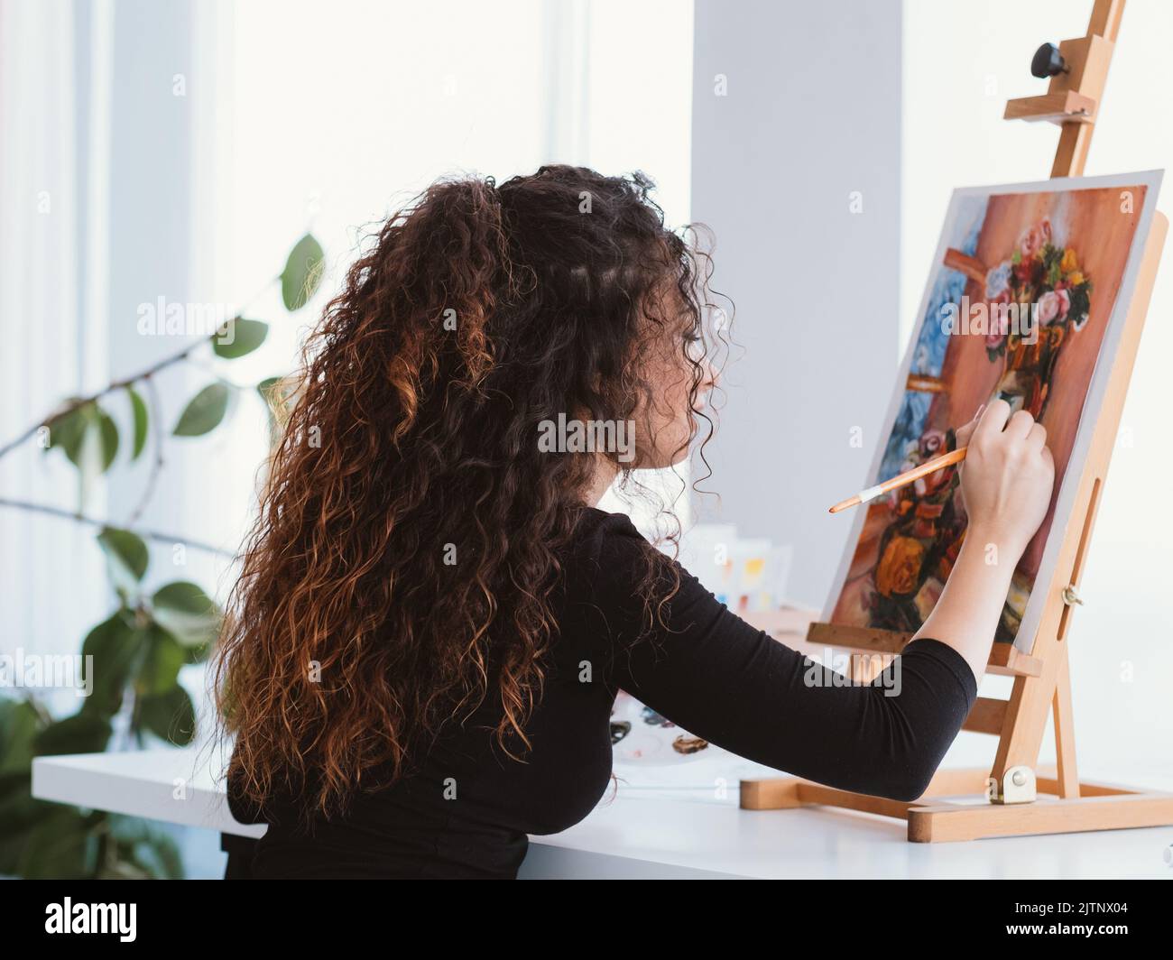 art hobby talented lady still life painting home Stock Photo