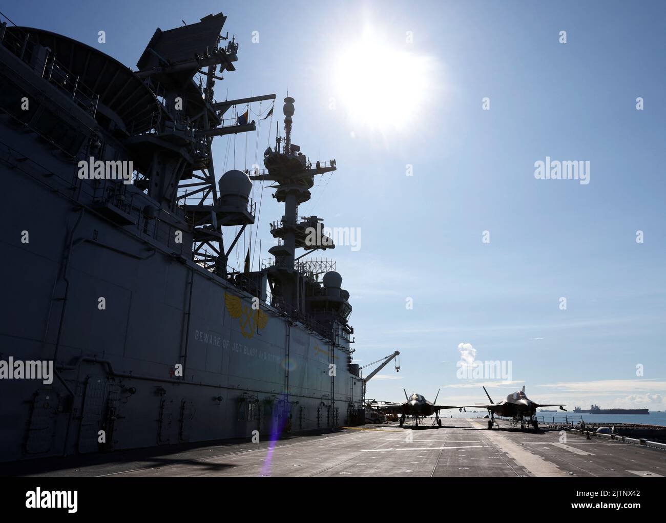 Lockheed Martin F-35 Lightning II aircraft are seen on the flight deck of amphibious assault ship USS Tripoli (LHA-7) at Changi Naval Base in Singapore September 1, 2022. REUTERS/Edgar Su Stock Photo