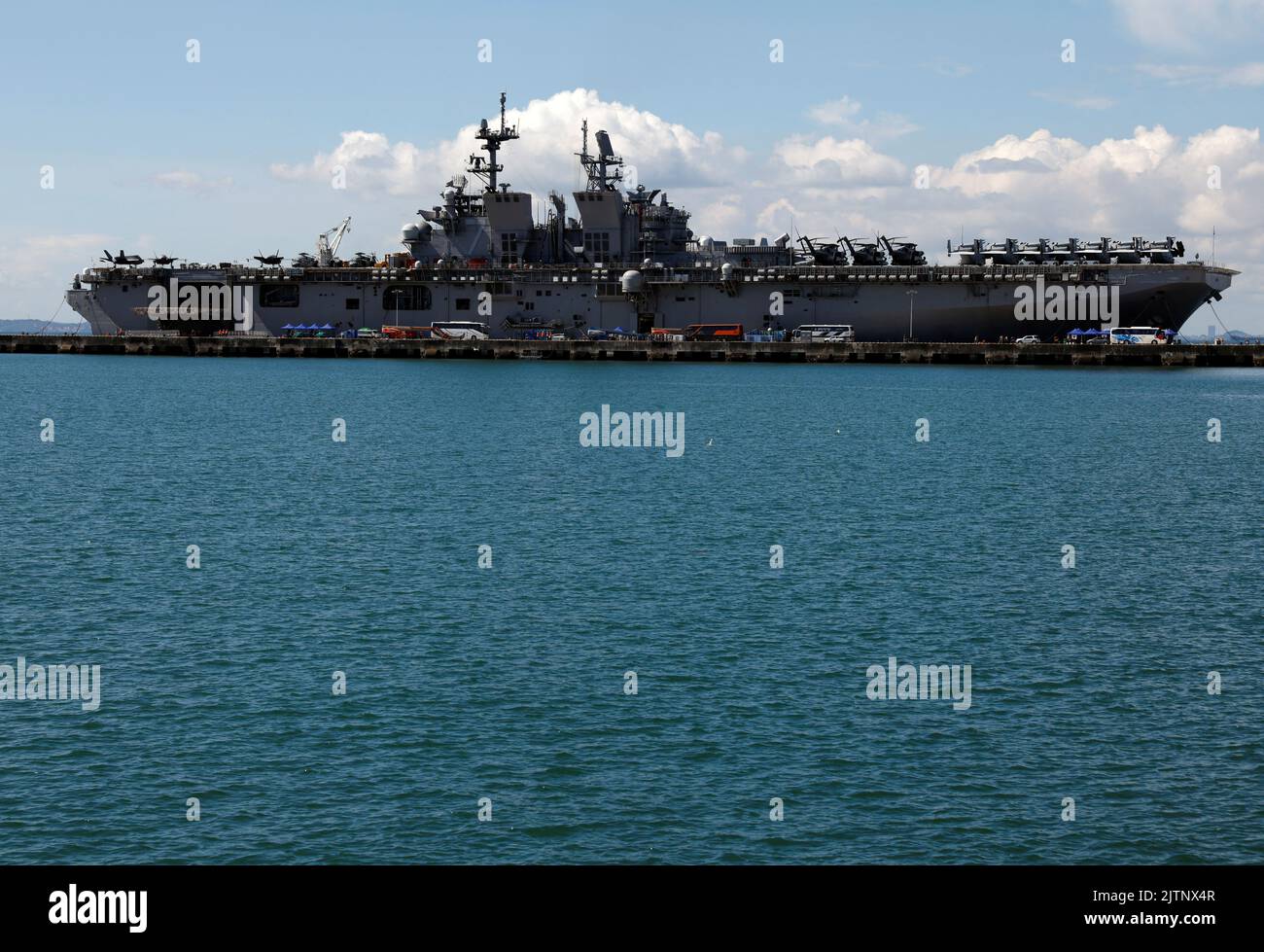 Amphibious assault ship USS Tripoli (LHA-7) is seen docked at Changi Naval Base in Singapore September 1, 2022. REUTERS/Edgar Su Stock Photo