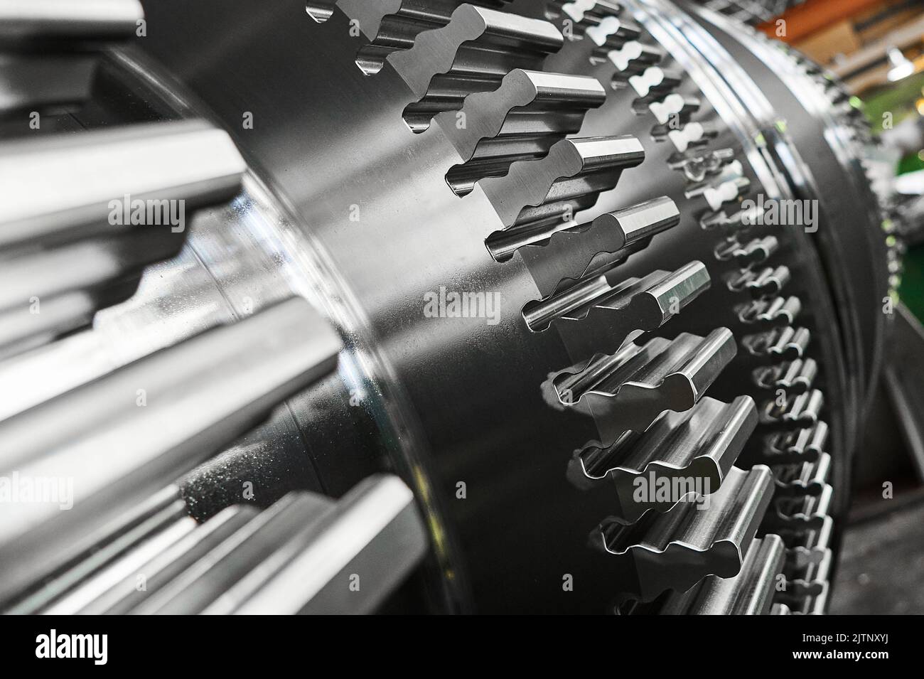 Steam turbine shaft with firtree blade fastening at plant Stock Photo