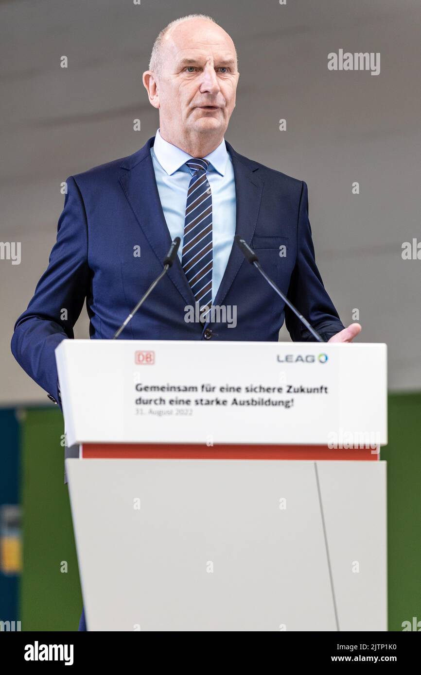 Peitz, Germany. 31st Aug, 2022. Dietmar Woidke, Minister President of the State of Brandenburg, speaks at the signing of the training pact between Deutsche Bahn and LEAG. The agreement is signed by the personnel directors of Deutsche Bahn, Seiler, and LEAG, Waniek. From 2025, Deutsche Bahn will take over the training workshop of the Lusatian energy company LEAG at the Jänschwalde power plant in the Spree-Neiße district. Credit: Frank Hammerschmidt/dpa/Alamy Live News Stock Photo