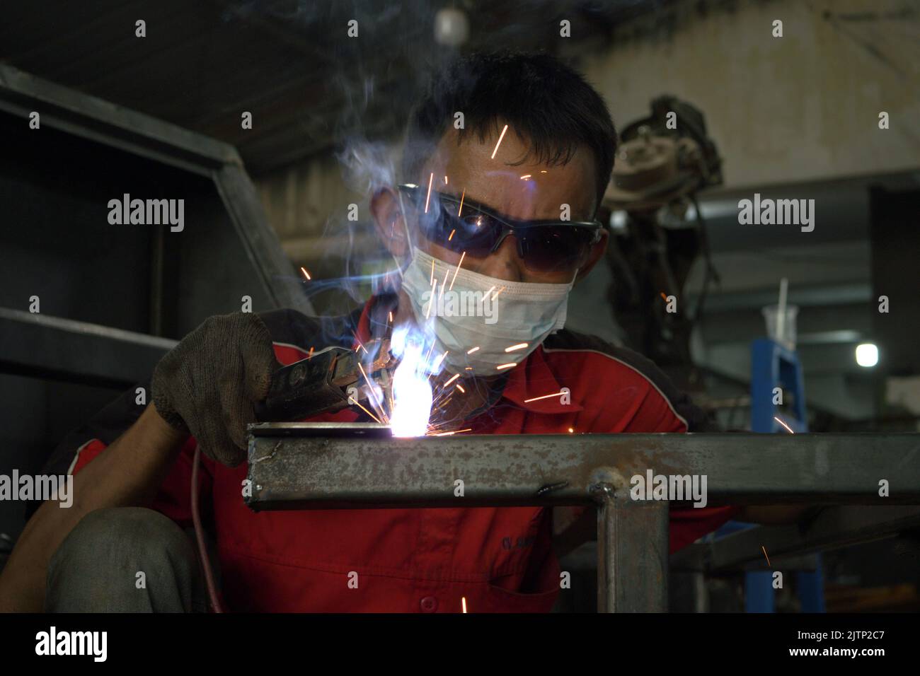 Worker Welding Iron Stock Photo Alamy