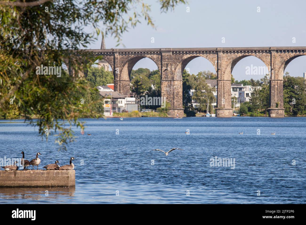 old railway bridge across the river Ruhr, lake Harkort, Herdecke, North Rhine-Westphalia, Germany. altes Eisenbahnviadukt ueber die Ruhr, Harkortsee, Stock Photo