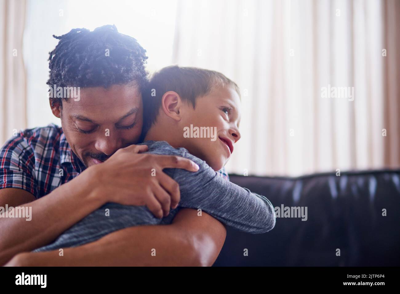 Filling each others lives with endless amounts of love. a father and son spending some quality time together at home. Stock Photo