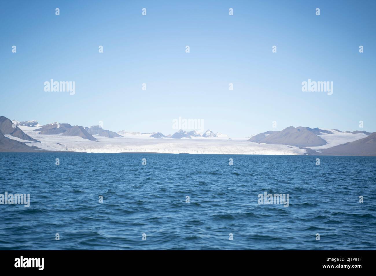 landscape view of an ice glacier in Svalbard islands, in the arctic sea  Stock Photo