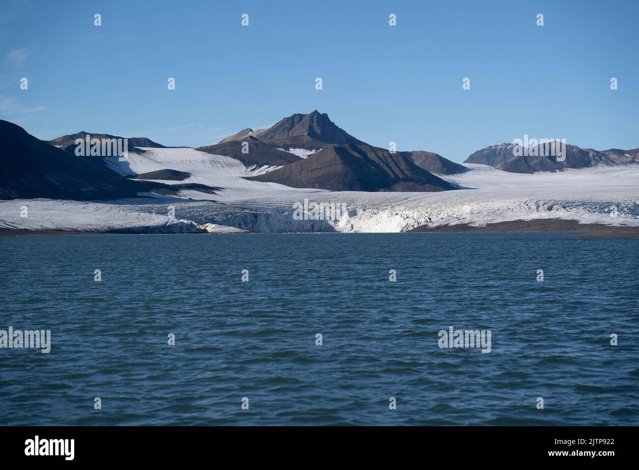 landscape view of an ice glacier in Svalbard islands, in the arctic sea  Stock Photo