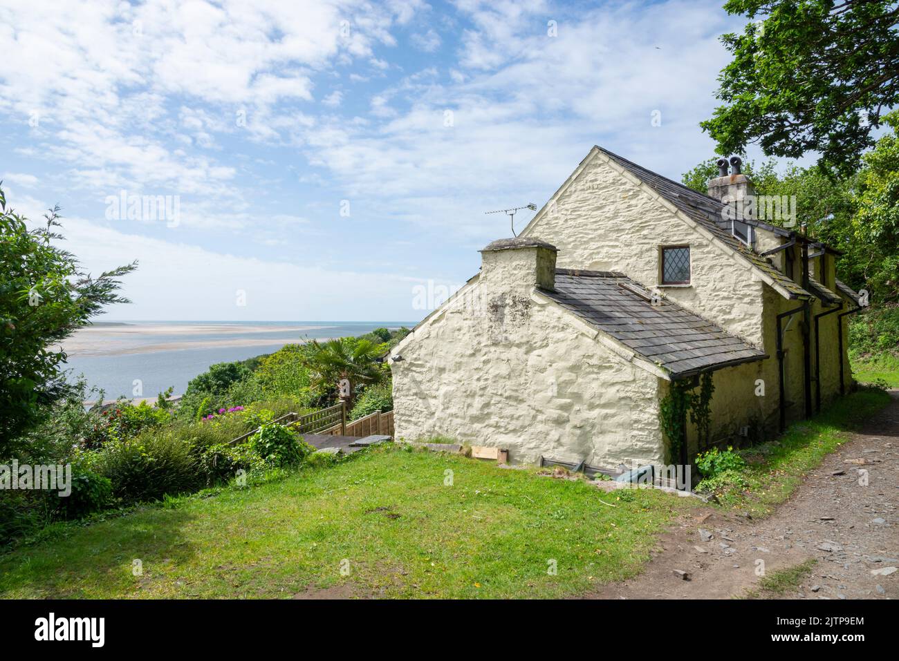 Old cottage overlooking the Glaslyn estuary near Borth-y-Gest on the coast of North Wales. Stock Photo