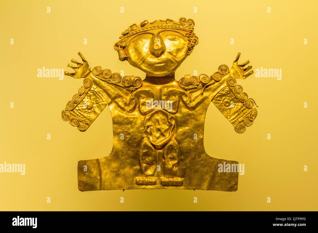 Golden object from the cemetery of Malagana. Museo del Oro, Bogota, Colombia. Stock Photo