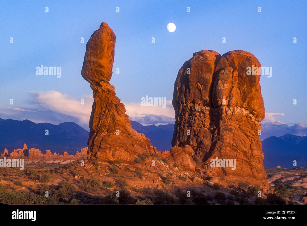 Moonrise over the La Sal Mountains and Balanced Rock in Arches National ...
