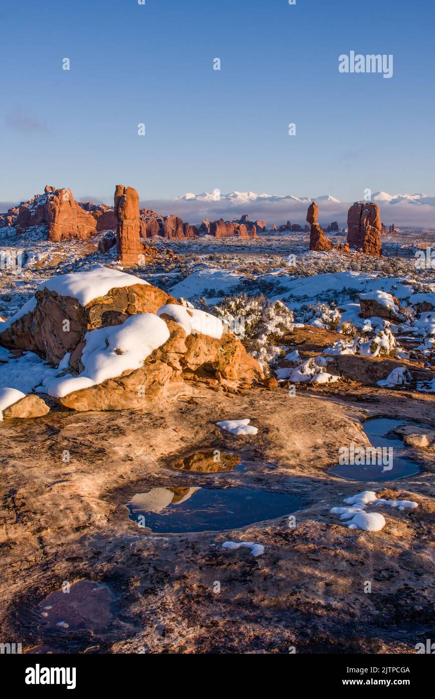 Reflections in melting snow pools ater a winter storm. Near Balanced