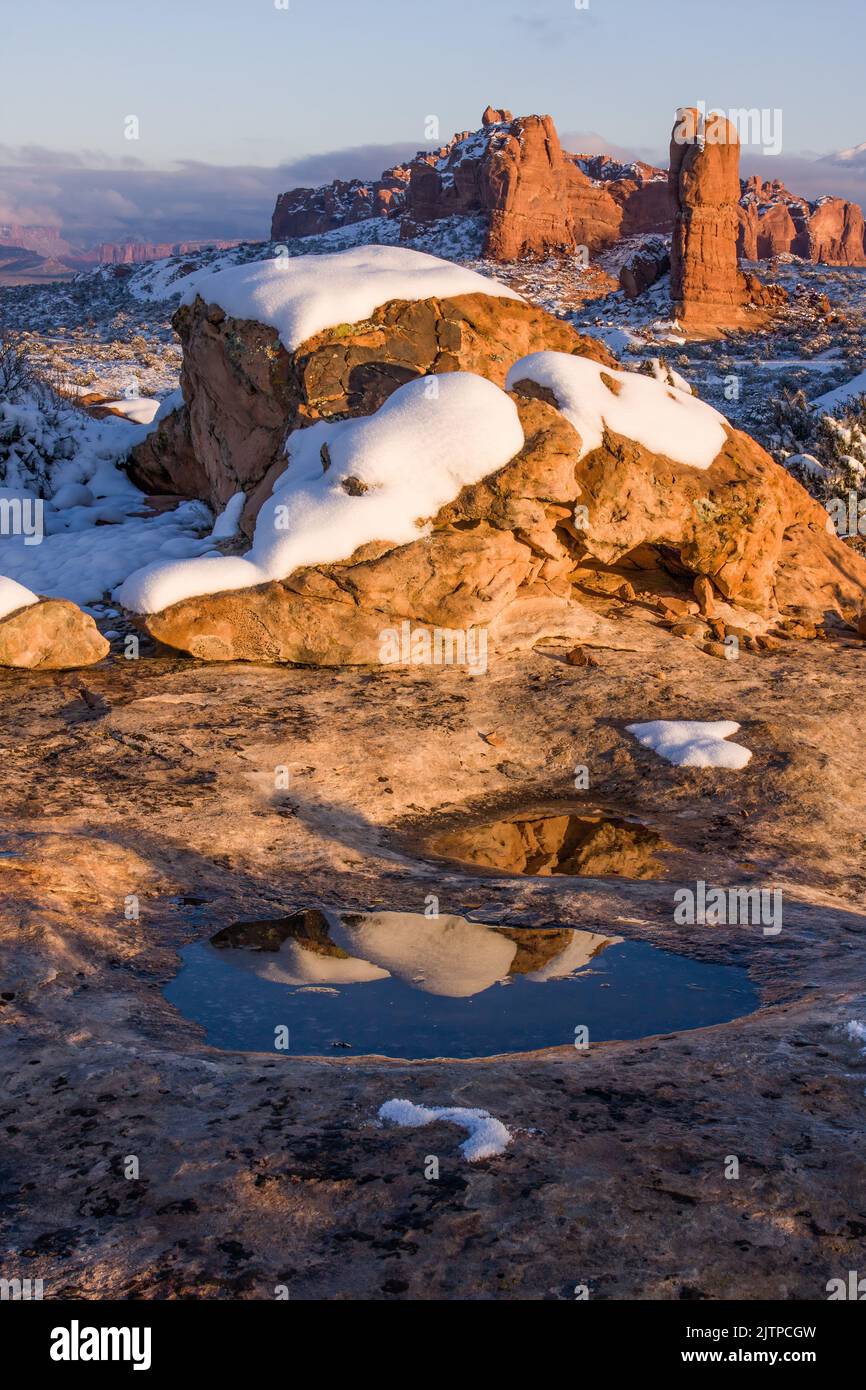 Reflections in melting snow pools ater a winter storm. Near Balanced