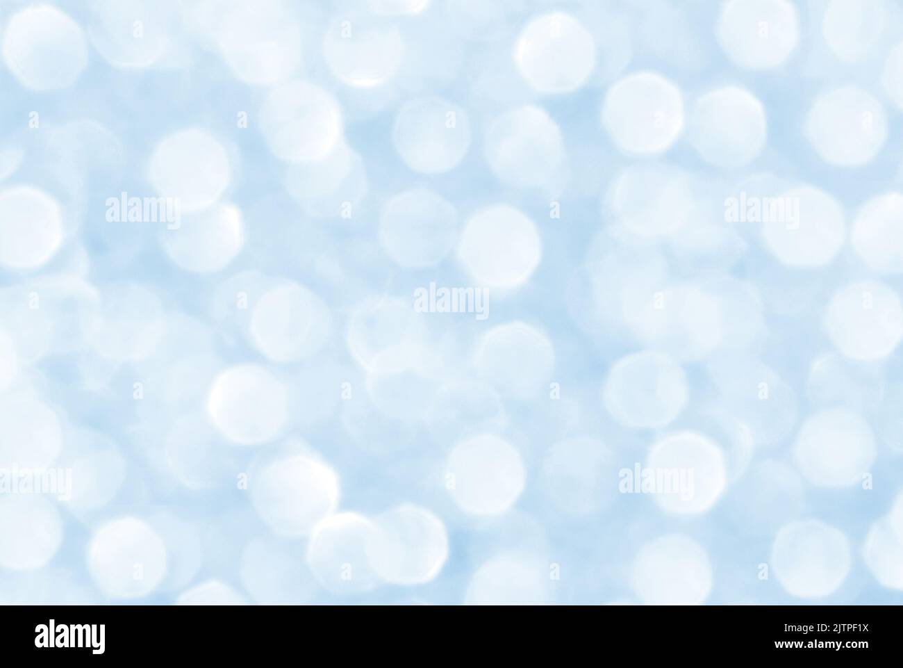 Abstract bokeh light snowfall background. Soft blue and white bokeh ...