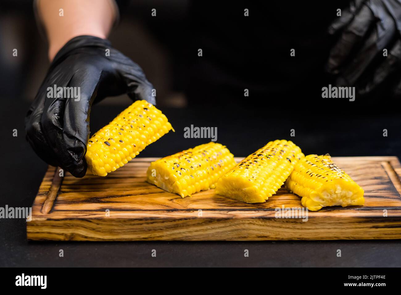 baked bonduelle corn cob pieces melted butter Stock Photo Alamy