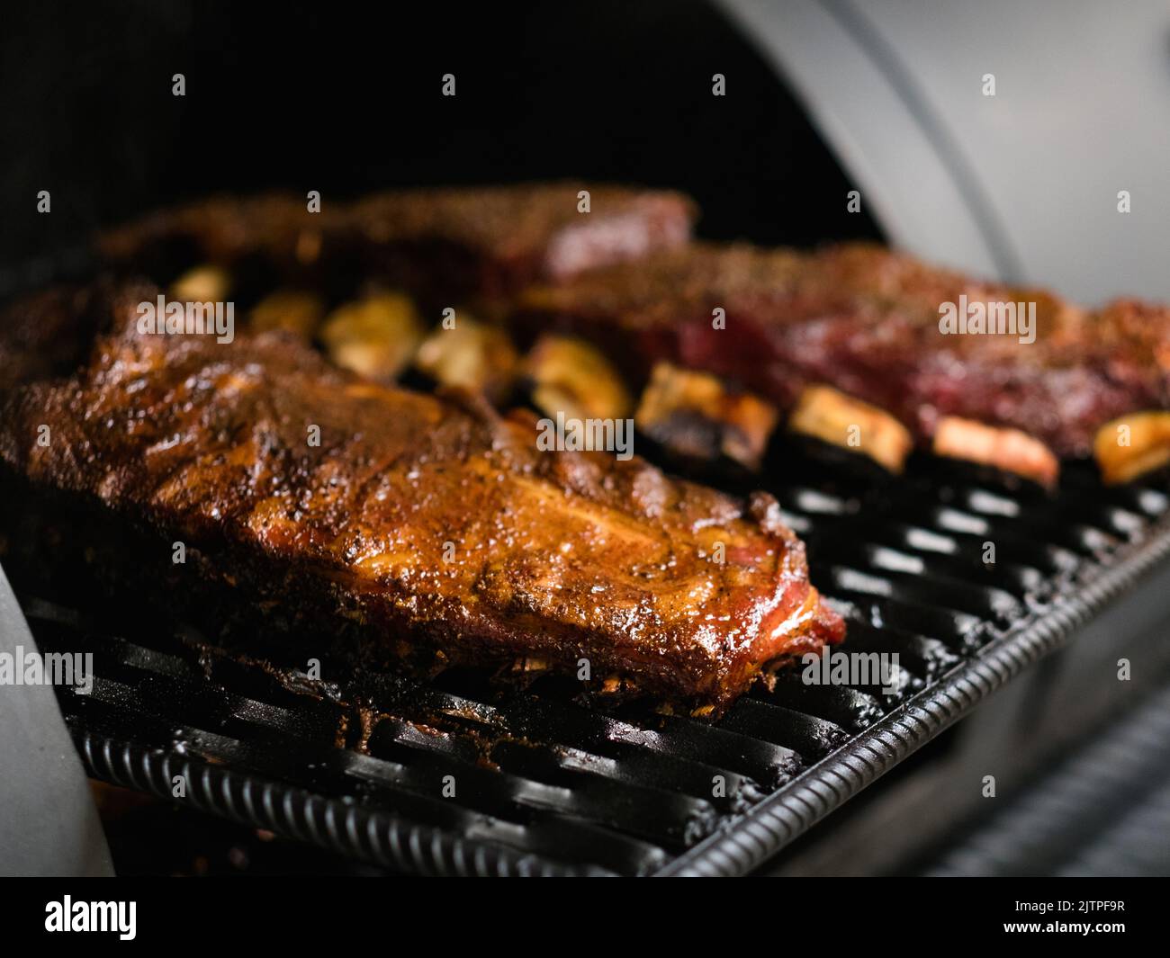 professional kitchen appliance ribs bbq smoker Stock Photo