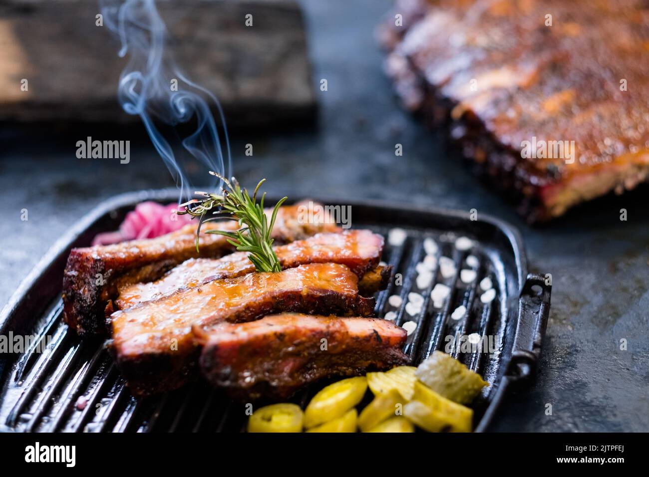 grill restaurant menu smoked pork ribs rosemary Stock Photo Alamy