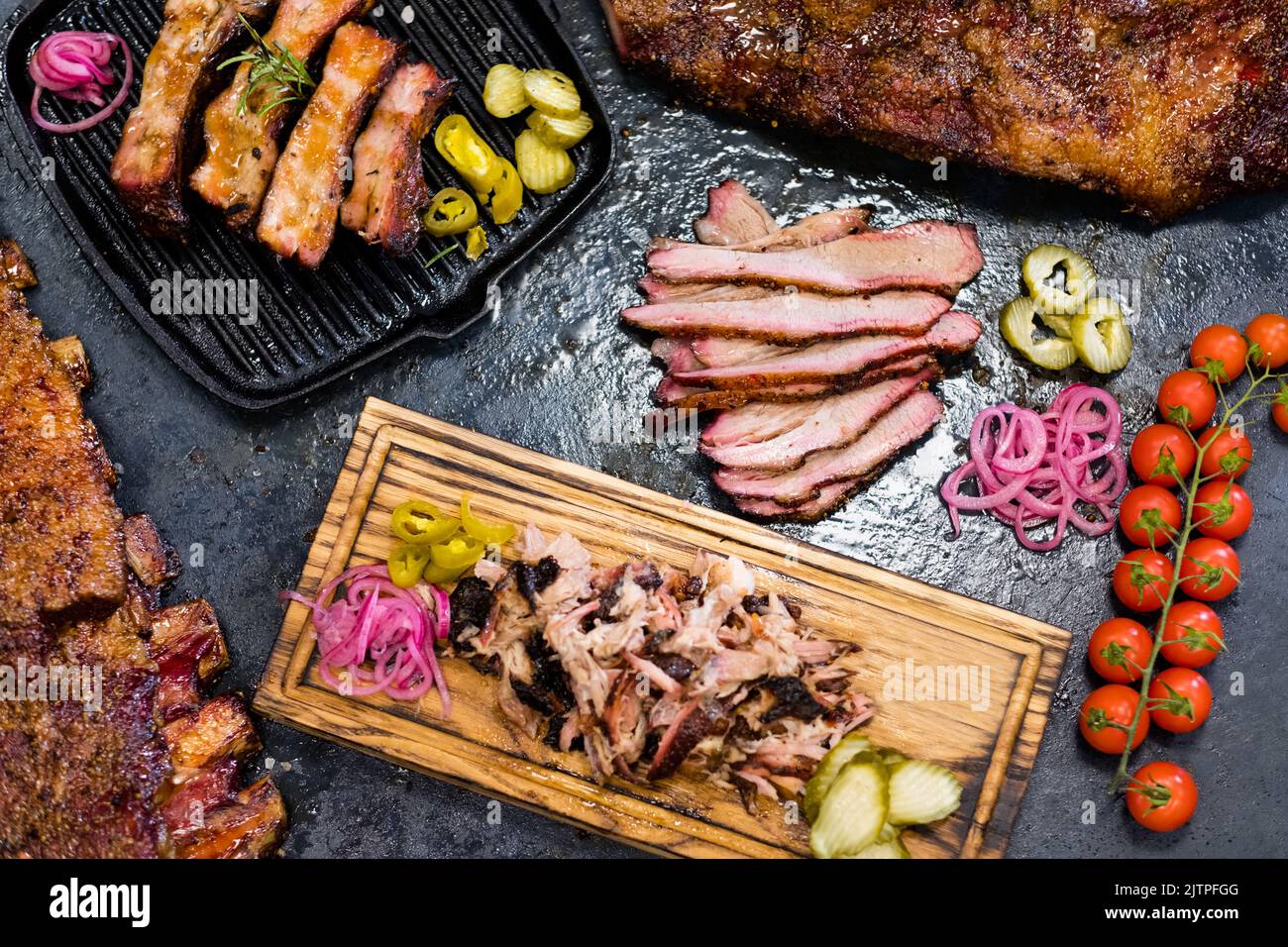smoked meat assortment beef brisket pulled pork Stock Photo Alamy