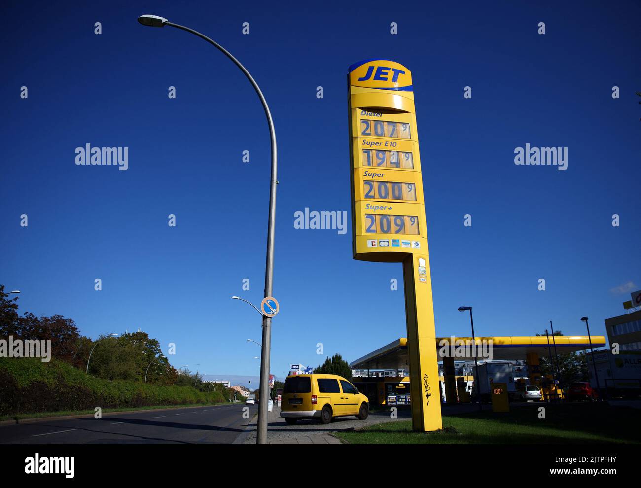A car makes its way to a filling station as petrol prices are displayed on an indicator board after the end of the fuel discount in Berlin, Germany, September 1, 2022. REUTERS/Lisi Niesner Stock Photo